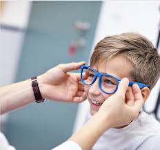 Child trying on durable, flexible eyeglass frames
